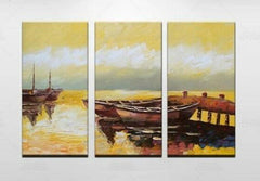 "TWO BOATS TIED AT THE GOLDEN DOCK"